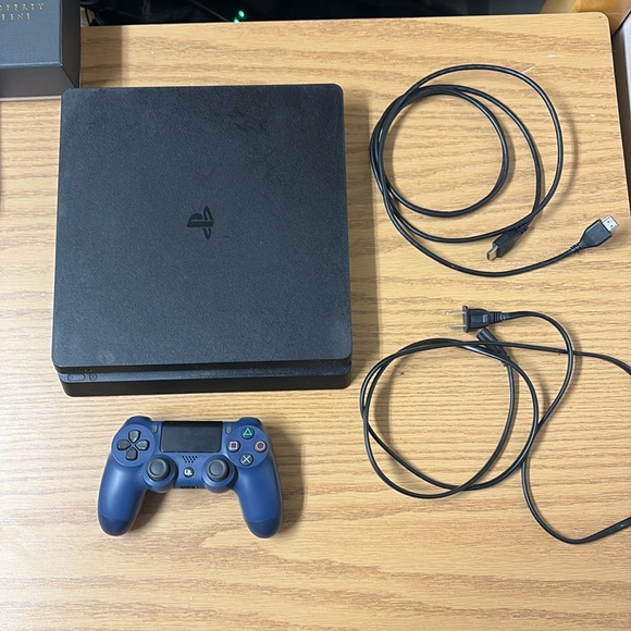 Used PS4 Great condition works perfectly.comes with controller in good condition